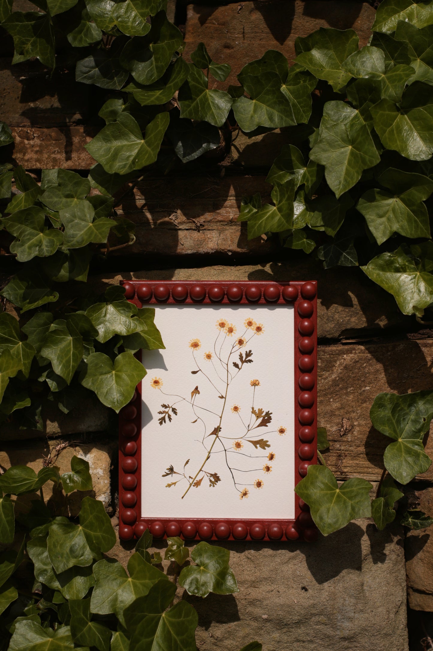 Brick Red Stained Bobbin Frame