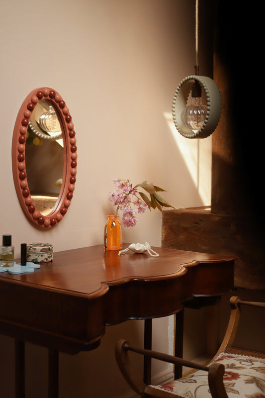 Brick Red & Terracotta Stained Wood Oval Bobbin Mirror