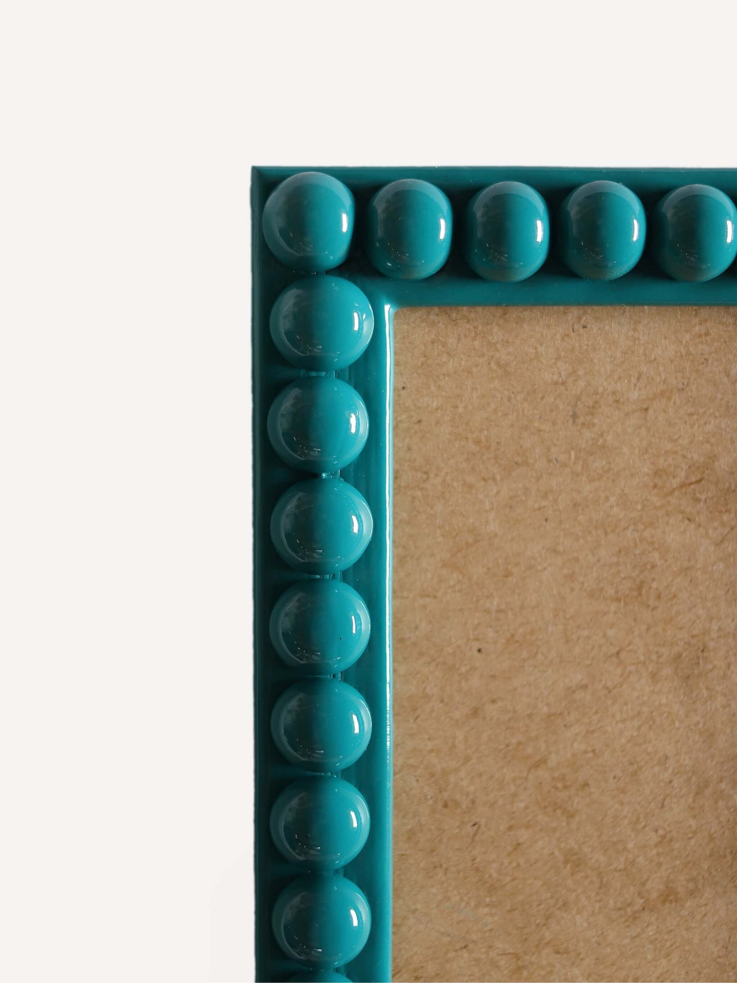 Teal Bobbin Frame close up