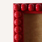 Crimson Red Bobbin Frame close up