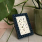 Inky Blue Bobbin Frame with a picture inside 